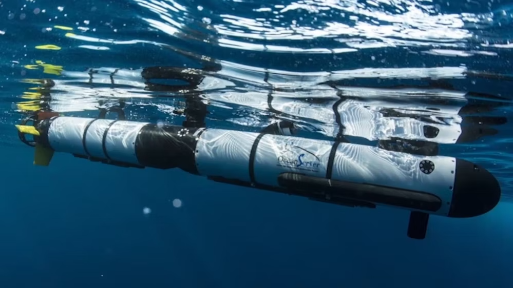 The IVER3 autonomous underwater vehicle diving, from the perspective of being underwater.